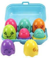 Toomies giocattolo Hide & Squeak Bright Chicks scatola uova sensoriale
